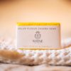 Solar Plexus Chakra Soap, wrapped on cream waffle fabric with blurred dried grass | Shine Body & Bath