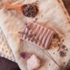 Third Eye Chakra Soap, unwrapped on cream and purple linen tea towels with lavender and crystals | Shine Body & Bath