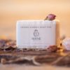 Crown Chakra Soap, wrapped on wooden board with rose buds and crystals | Shine Body & Bath