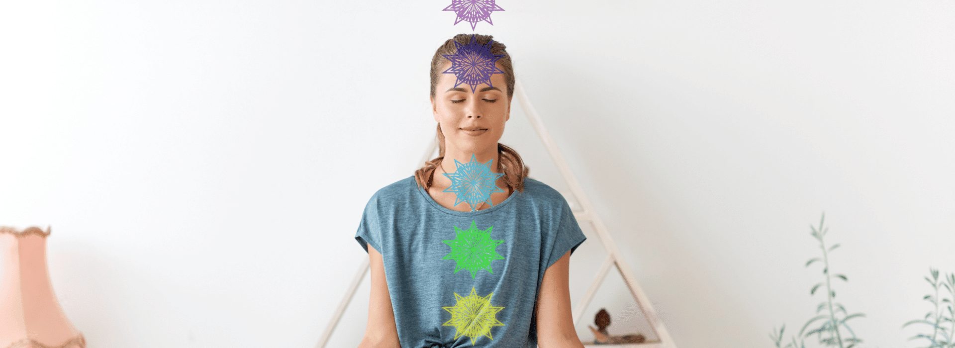 Woman meditating with Chakra symbols | The Secret to Breathing Well Blog | Shine Body & Bath Chakra Soap | Blog