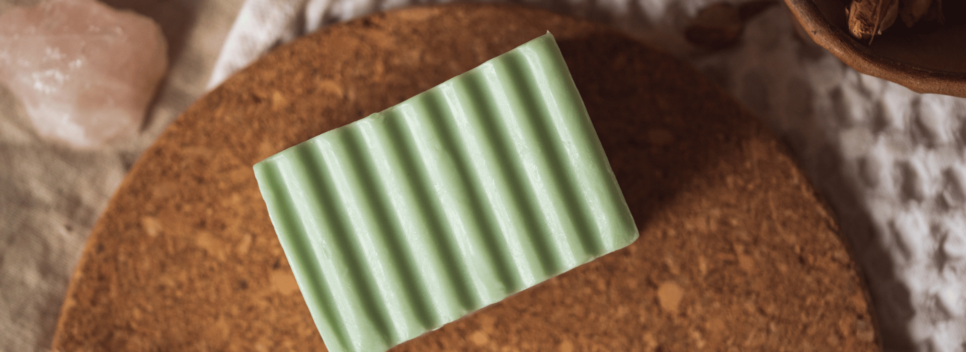 Heart Chakra soap unwrapped on cork board | The Secret to Breathing Well Blog | Shine Body & Bath Chakra Soap | Blog