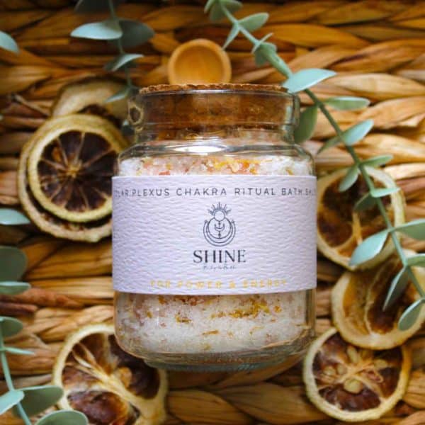 Solar Plexus Chakra Ritual Bath Salts for Power & Energy | Glass jar of bath salts on wicker basket with lemon slice | Shine Body & Bath