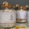 Group of Chakra Ritual bath salts on wooden tray | Grounding & Strength in foreground | Shine Body & Bath