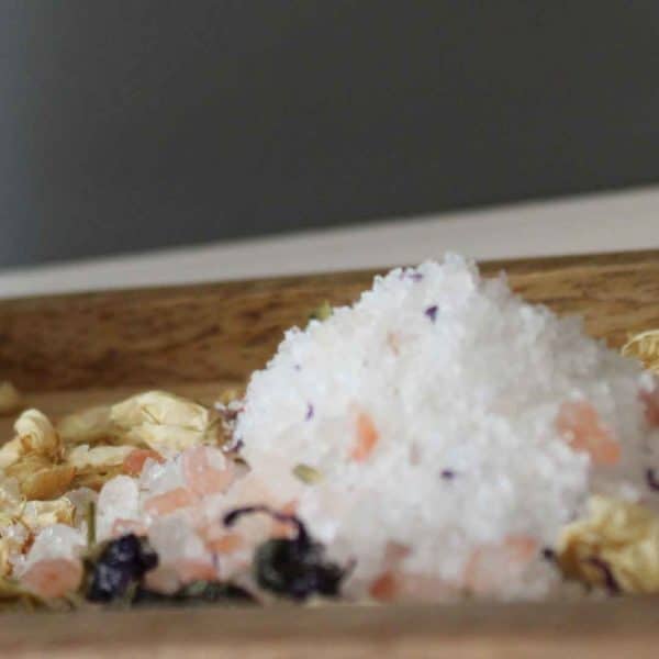 Pile of loose Chakra Ritual bath salts on wooden tray | Shine Body & Bath