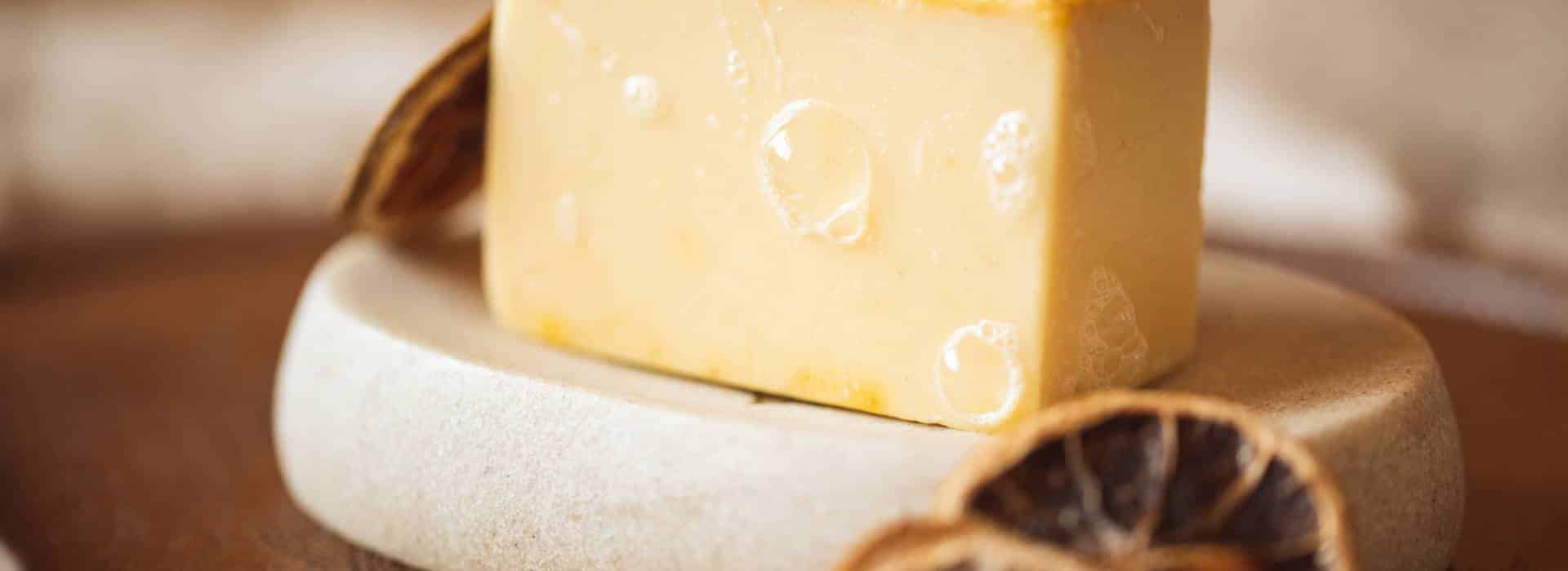 Shine Solar Plexus Chakra Soap in yellow sitting on a stone soap dish | Activate your Solar Plexus Chakra Fire! | Shine Body & Bath Chakra Soap | Blog