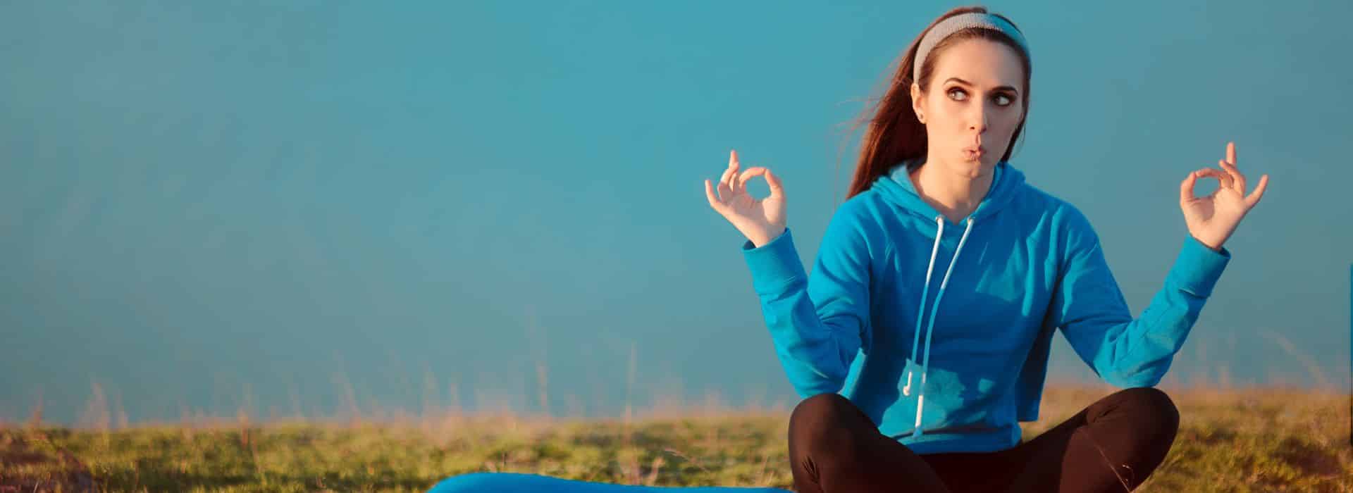 Woman meditating with eyes open | How to live more joyfully | Shine Body & Bath Chakra Soap | Blog