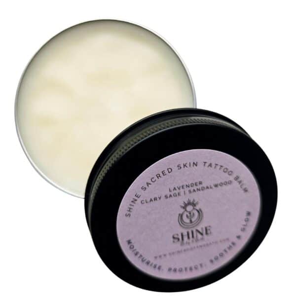 Shine Sacred Skin Tattoo Balm | Cutout image of front of tin open