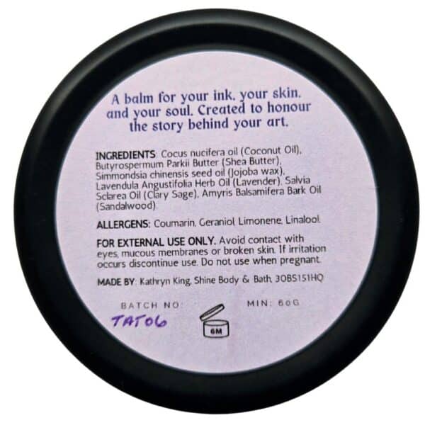 Shine Sacred Skin Tattoo Balm | Cutout image of back of tin