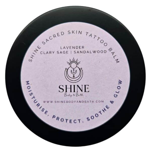 Shine Sacred Skin Tattoo Balm | Cutout image of front of tin