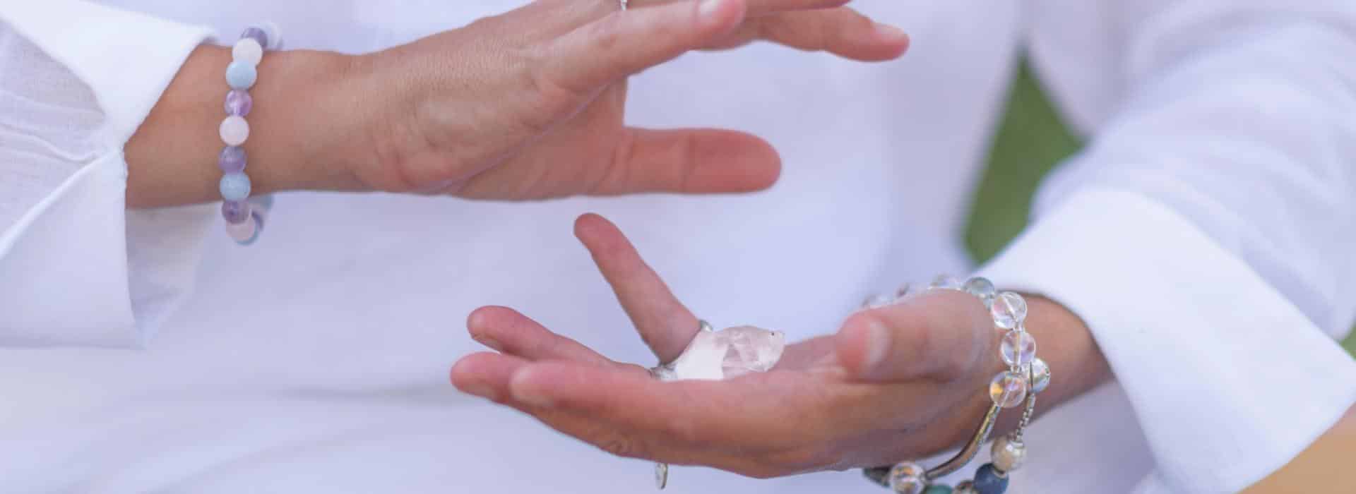Manifesting vs Liberating Energy | Two hands facing each other creating energy